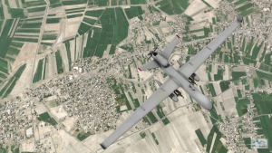 MVRsimulation VRSG real-time scene of an MQ-9 entity in flight over virtual Hajin, Syria, 3D terrain. 